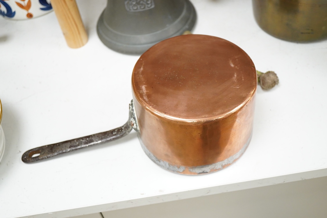 A bronze bell dated 1839 and two Victorian copper and brass saucepans